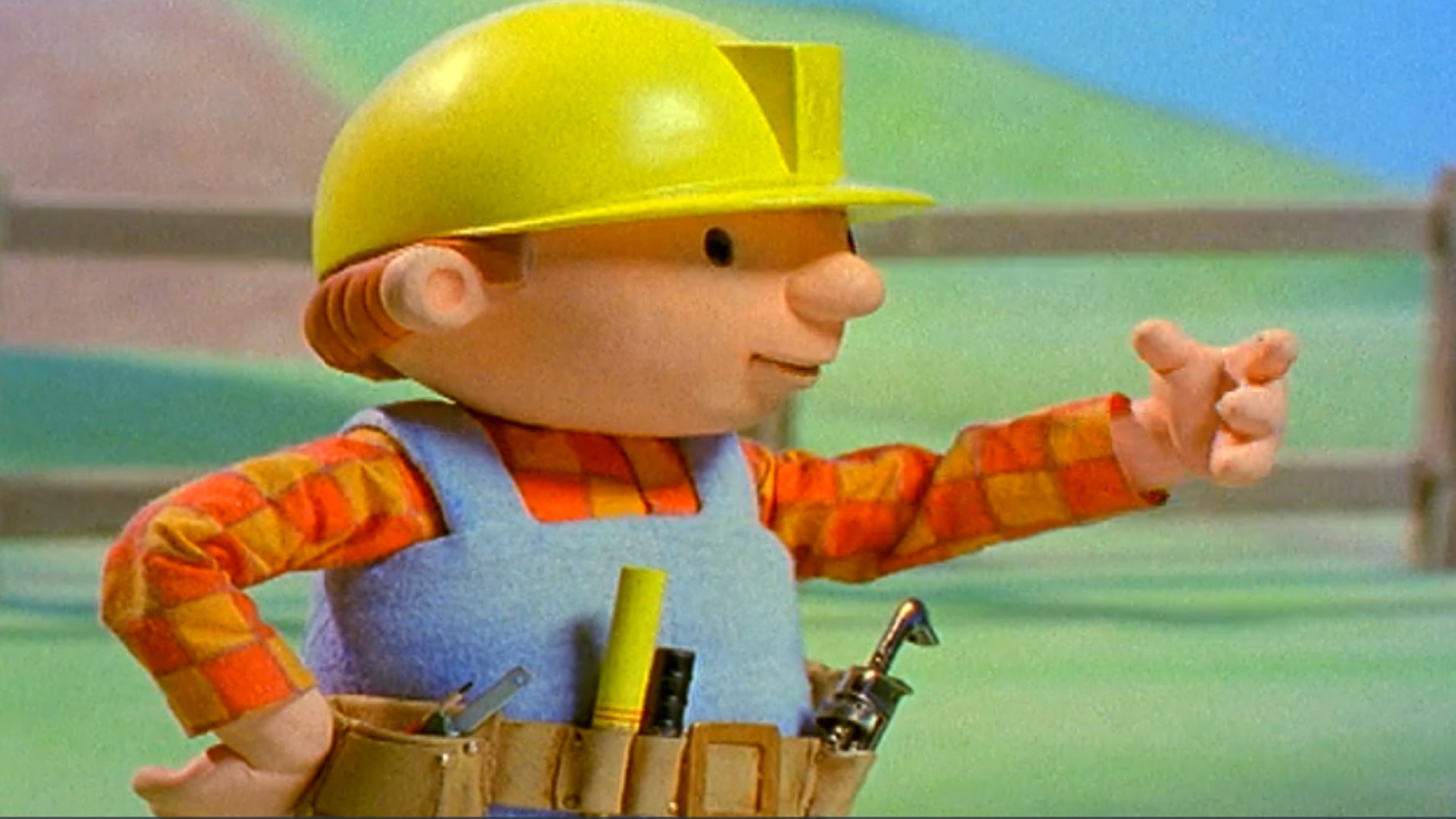 Bob o Construtor sorrindo com seu capacete amarelo